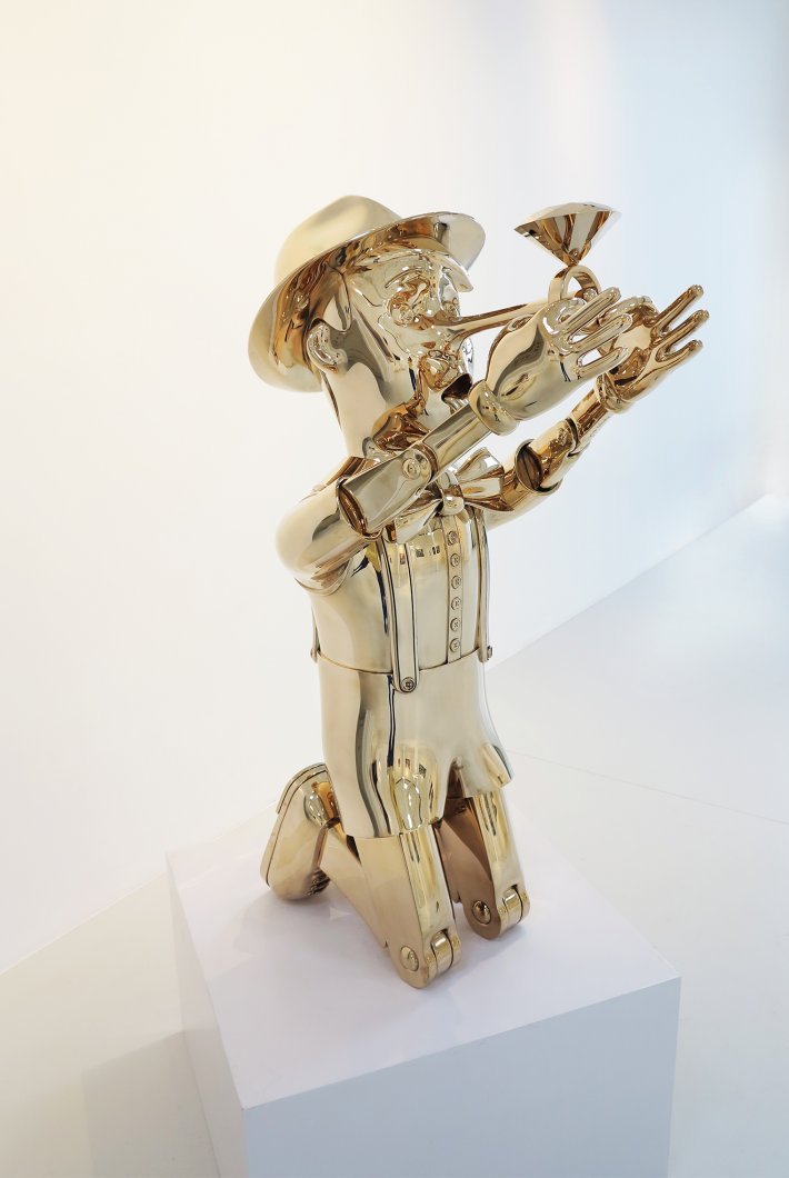 Joseph Klibansky's polished bronze sculpture Reflections of Truth 1
